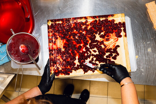 Preparing Berry Topping for Dessert