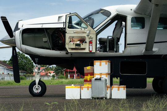 Luggage and Cargo Beside Small Turboprop Aircraft