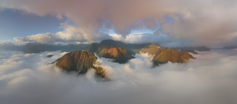 Dramatic Mountain Peaks Rising Above a Sea of Clouds