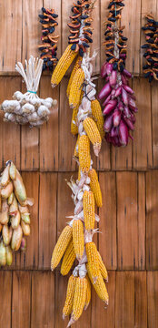 a traditional harvest display commonly found on rustic farms, village houses, or outdoor autumn markets