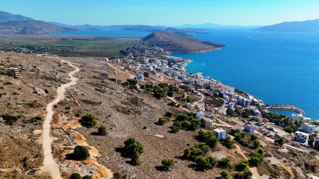 Aerial View of Lekursi Castle in Saranda, Albania, Ionian Sea and Coastal Landscape