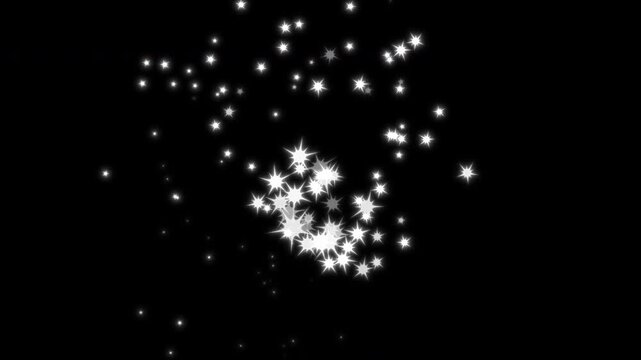 4K shining white glittering star dust trail sparkling particles on black background. Looping magic pixie dust path overlay, glowing fairy tale twinkle stars burst transition video.