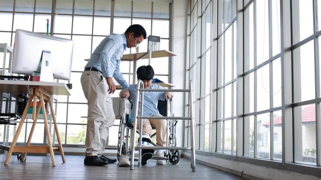 orthopedic walking, Crutches Walks Confidently. Child Step in Rehabilitation with Leg Brace. Asian father helping to support his son, who has a broken ankle