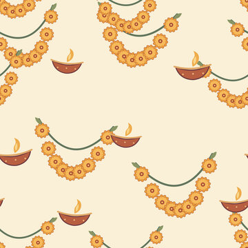 Marigold garlands and oil lamps seamless pattern on cream