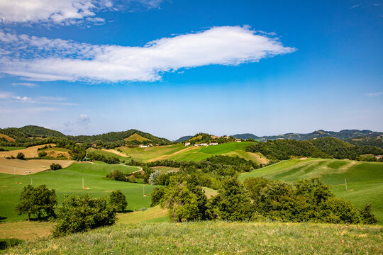view from Castelnovo ne' Monti  to the scenic hilly landscape in the continental Apennines province Regio Emilia in the Umbria-Marche Apennines, Italy.