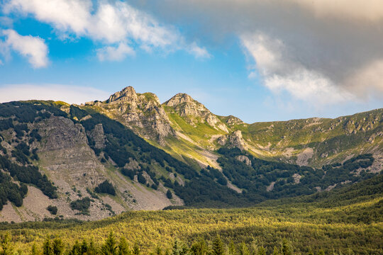 view from Fivizzano to mountains of Appenines,  peaks form part of the Northern Apennines - Appennino Tosco-Emiliano. View frames the rugged limestone formations near the Passo del Cerreto.