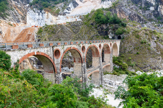 historic Ponti di Vara stone bridges crossing the Fantiscritti marble quarry area in the Apuan Alps near Carrara, Tuscany, Italy