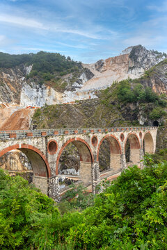 historic Ponti di Vara stone bridges crossing the Fantiscritti marble quarry area in the Apuan Alps near Carrara, Tuscany, Italy