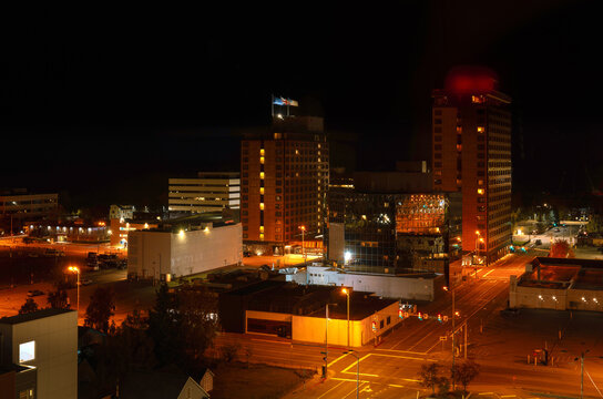 Anchorage Alaska downtown aerial cityscape at twilight with dramatic cloudscape in United States