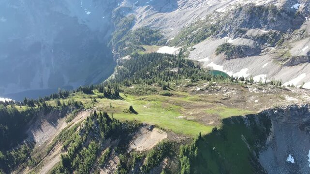 Grassy plain above Rainy Lake in Maple Pass Loop, North Cascades