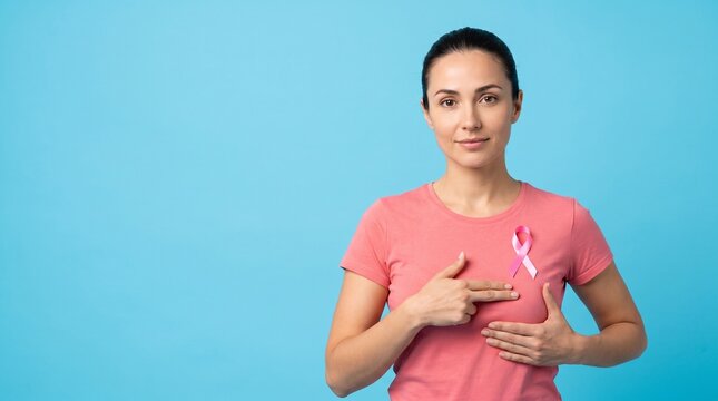 A woman demonstrating breast self-examination techniques for Pink October cancer awareness month