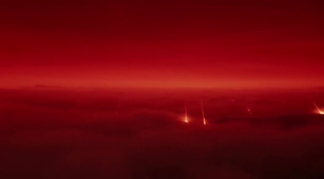 Massive explosion in desert sand dunes sending cloud of dust into sky 3d rende