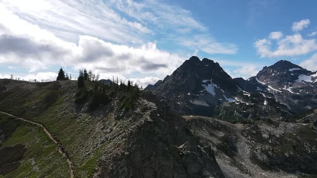 Pan out overlooking the switchback trail going up to maple pass loop in North cascades in Washington
