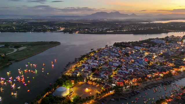 Hoi An illuminated at night with colorful lanterns and festival lights
