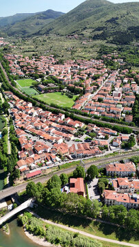 Drone footage of Prato city in sunny Tuscan summer morning.