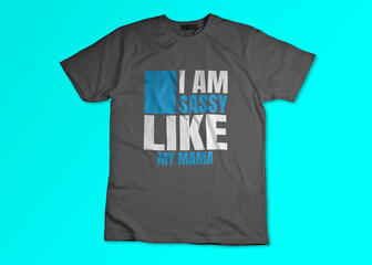 Fototapeta premium Dark grey t-shirt with typography design featuring the slogan I am sassy like my mama on bright blue background