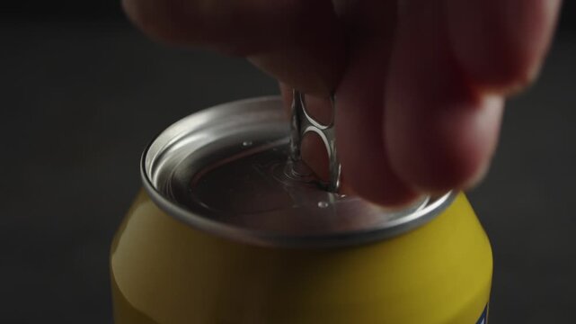 Opening a Yellow Aluminum Can &ndash; Macro Close-Up Shot