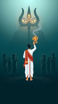 Man performs aarti before glowing trident eyes of durga amid crowd of praying devotees at night