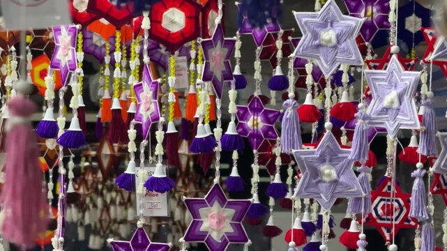 Hanging star shaped yarn mobile ornaments in Chiang Mai