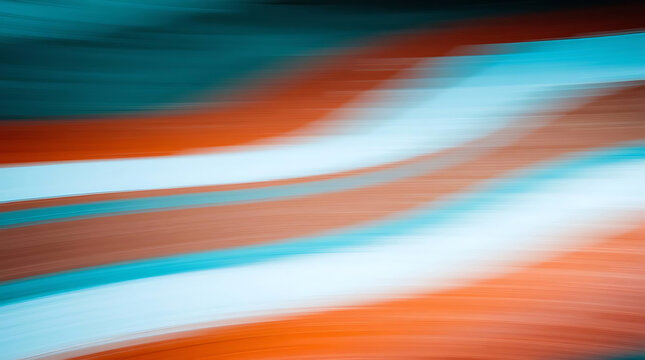 Abstract motion blur of orange and teal stripes across a white background suggesting speed and dynamism