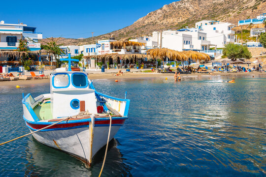 View of sea bay with beautiful beach and traditional church on Karpathos island in Foiniki village, Greece