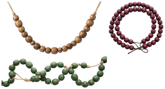 A set of rustic wooden bead garlands in varied colors and sizes, ideal for farmhouse and natural home decor.