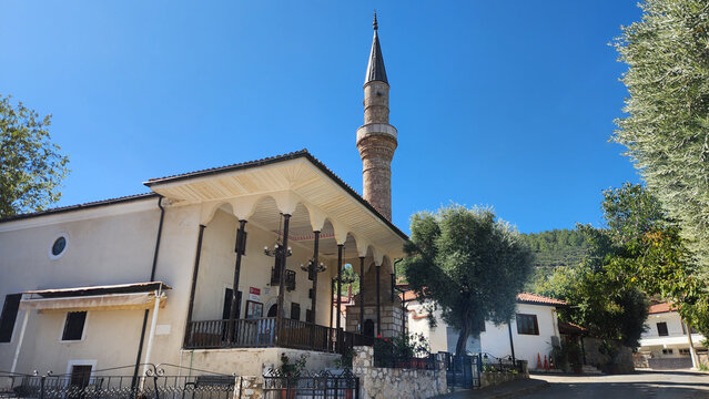 Siyami Bey Mosque in Boz&uuml;y&uuml;k, Yatağan, Muğla, a 19th-century Ottoman mosque featuring a spacious timber-columned prayer porch and finely decorated painted ceilings, reflecting traditional Aegean archi