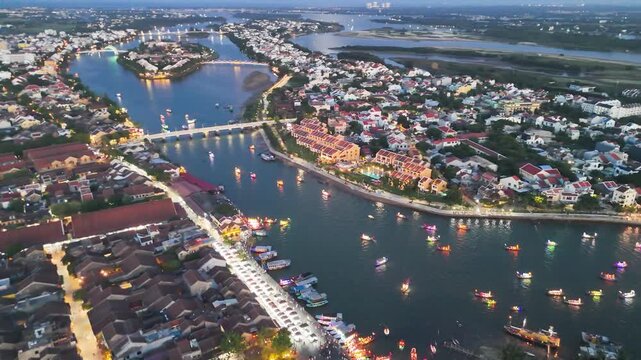Dramatic aerial view of historic Hoi An town illuminated