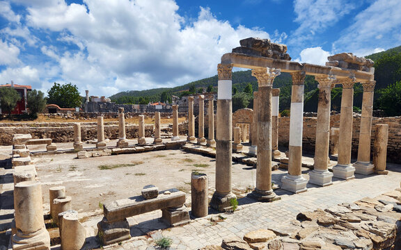The colonnaded courtyard, or palaestra, of the Roman Bath at Stratonikeia Ancient City in Yatağan, Muğla, reflecting the site's Roman heritage alongside later Ottoman and Republican urban layers.