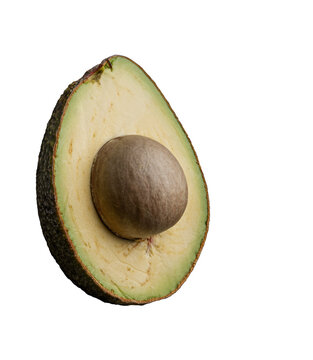 A fresh ripe avocado half with a large central pit isolated on a clean transparent background