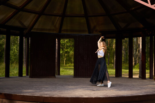 Woman Gestures Storytelling. Silent Rehearsal Featuring Woman Communicating Through Movement Outdoors