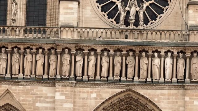 On a cloudy day in Paris, Notre-Dame Cathedral currently undergoing restoration following the fire is once again the site of ongoing architectural restoration work.