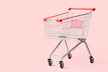 Consumerism and retail shopping, empty metal supermarket cart on a pink background for grocery store sales and e-commerce marketing campaigns © Pixel-Shot