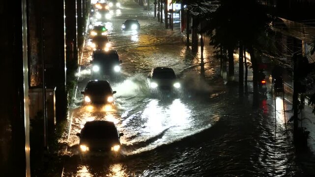 Night traffic. Bangkok Flash floods caused by monsoon rains have turned all 50 districts of Bangkok into official disaster zones.