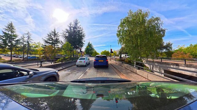 Car Roof Mounted Camera Unique and Ultra Wide Angle Footage of British Road Travel and Traffic. During Travel Car Was Passing Through Most of Cities Streets, Landscapes and Highways of England, UK