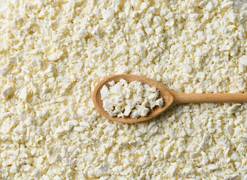 cottage cheese as background, top view. Fresh cottage cheese close up. food background.
