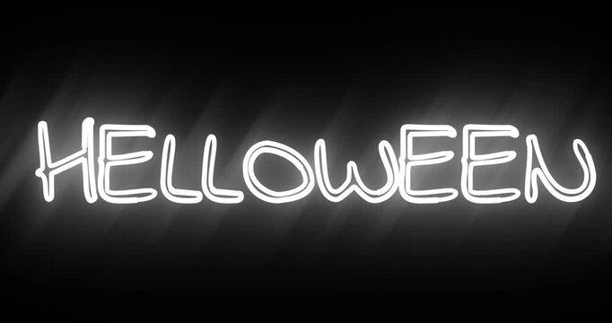 HALLOWEEN word written light neon effect against black background, conveying festive spooky atmosphere.