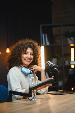 Content creator recording a podcast in home studio