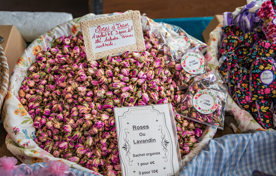 Pink rose buds for teas, cocktails and cooking at a market in Antibes, France