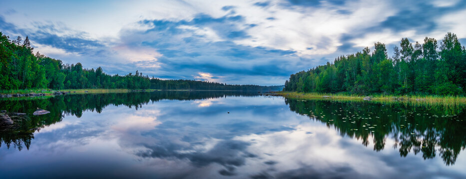 Hallangen lake panorama at sunset. Kalmar region in Sweden. Europe