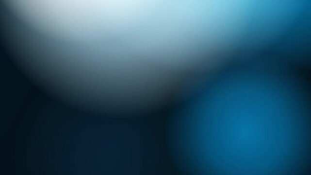 Abstract blurred background with soft gradients of light pink, warm orange, and cool blue colors