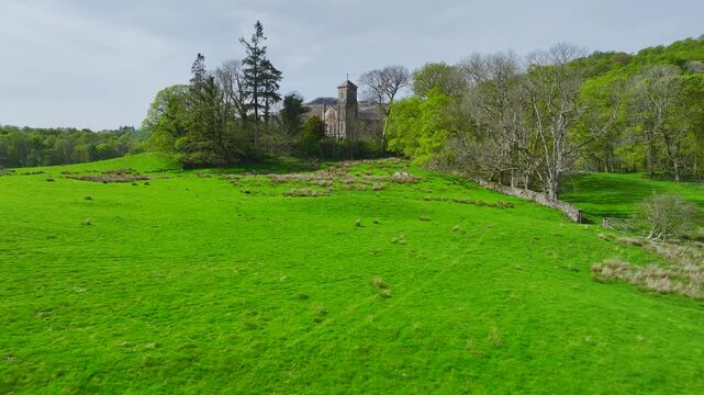 Holy Trinity Church from drone, Bog Lane, Brathay village, Lake District, Cumbria, England, United Kingdom