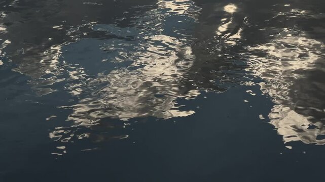 Sunlight reflecting on rippling water surface