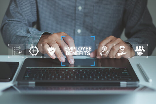 A businessman presents employee benefits options on a digital interface. Employee benefits and compensation strategy concept. Icons various benefits such as healthcare, insurance, and financial perks.