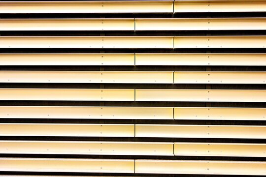 Horizontal louvers creating a textured pattern