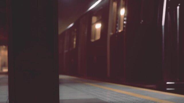 On a busy urban afternoon, the vibrant subway train glides into the station, stirring excitement among waiting passengers who prepare to board. The platform buzzes with anticipation.