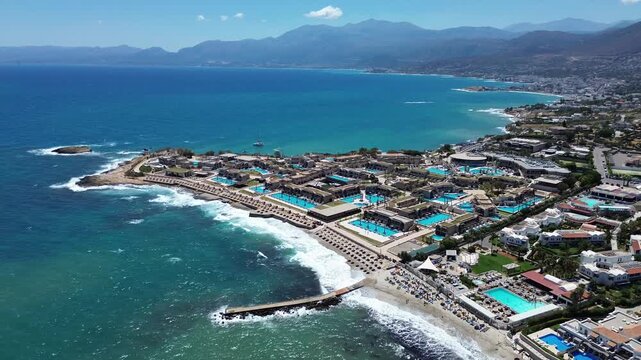 Aerial view of Nana Royal Premium resort and Spa surrounding Crete sea waters