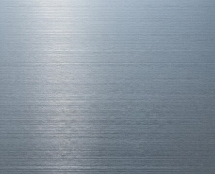 Minimal brushed titanium metal surface, fine horizontal texture