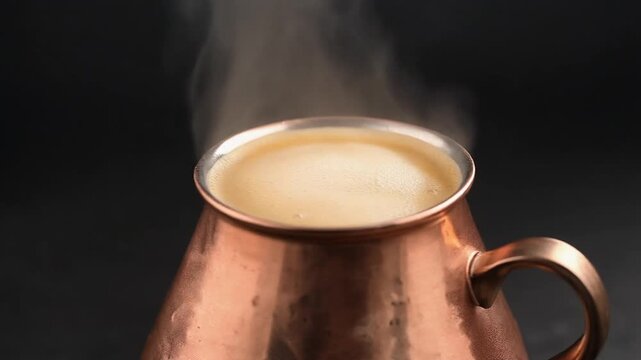 Foam rising in a copper dzezva