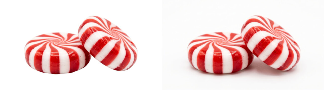 Two red and white striped peppermint candies leaning together with a glossy finish shown as PNG isolated with transparent background